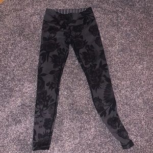 Adorable black, floral Lululemon leggings! Size 4